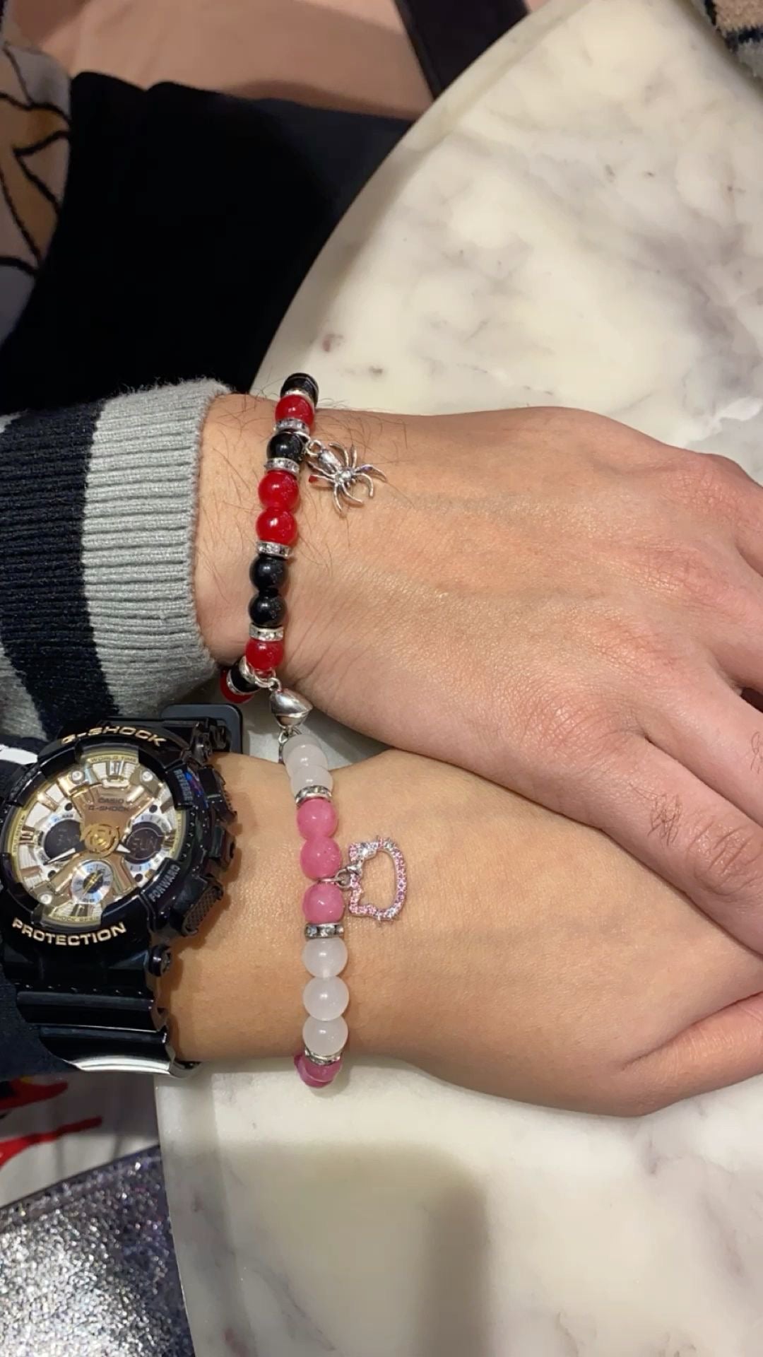Spider man / hello kitty pair bracelets