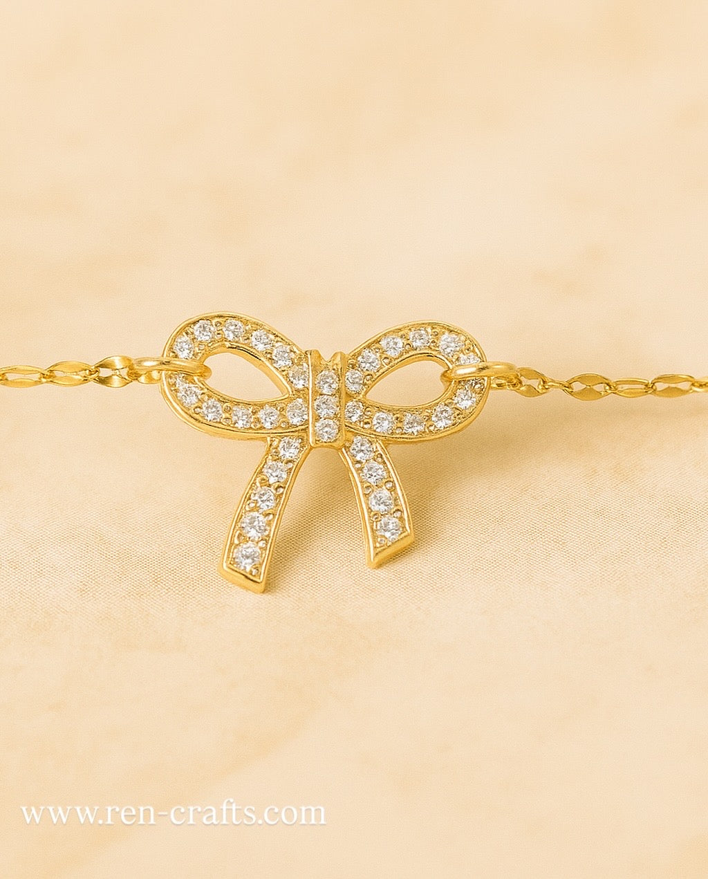 Stainless bow bracelet.