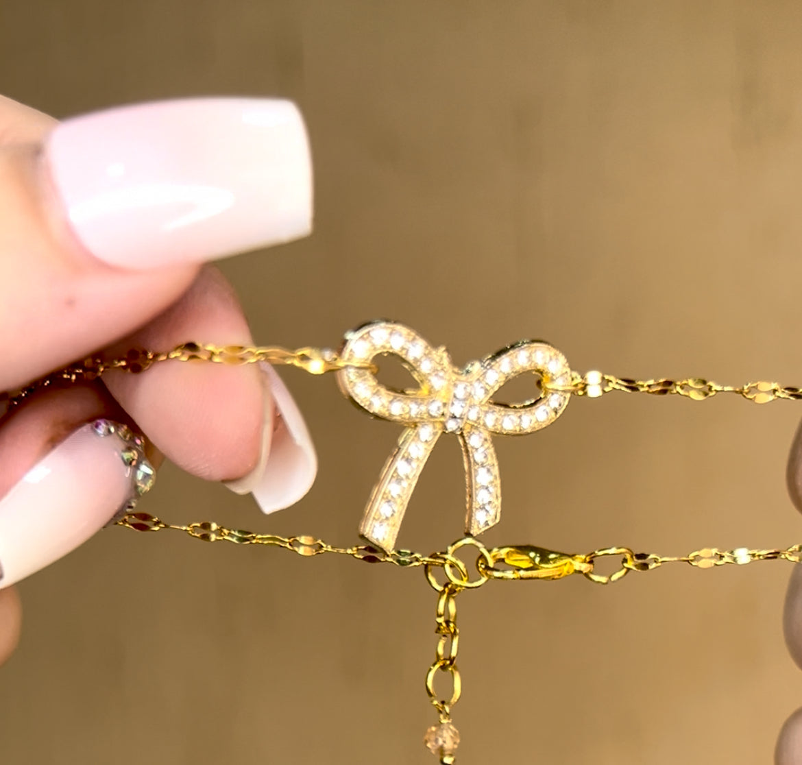 Stainless bow bracelet.