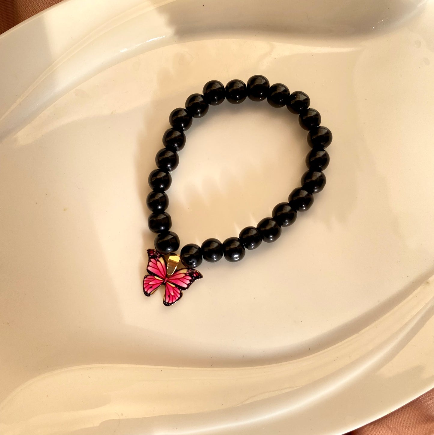 Hot pink butterfly bracelet